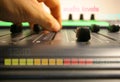 Hand controlling faders Royalty Free Stock Photo