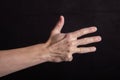 Hand counts four, four fingers outstretched, sign for four