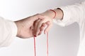 A hand of couple touch each other. The Faith of red thread brings destiny Royalty Free Stock Photo