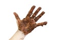 Hand covered in chocolate or mud