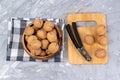 cracks walnuts with a nutcracker. Whole walnuts,walnuts kernels. selective focus Royalty Free Stock Photo
