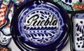 Puebla name painted in talavera