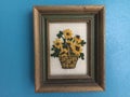 Hand crafted crewel picture of a basket of Sunflowers