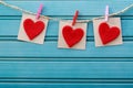 Hand-crafted felt hearts hanging with clothespins Royalty Free Stock Photo