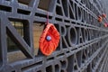 Hand crafted red poppy on a commemorative wall. Royalty Free Stock Photo