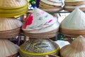 Hand crafted traditional Vietnamese leaf hats for sale in a market Hoi An, Vietnam, Asia Royalty Free Stock Photo