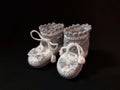 Hand crocheted booties for newborn. Royalty Free Stock Photo