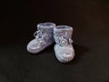 Hand crocheted booties for newborn. Royalty Free Stock Photo