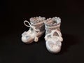 Hand crocheted booties for newborn. Royalty Free Stock Photo