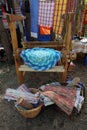 hand-crocheted and woven rugs on the background of an old loom Royalty Free Stock Photo