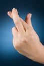 Hand with crossed fingers Royalty Free Stock Photo