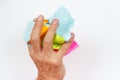 Hand crushes paper trash on white background Royalty Free Stock Photo
