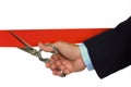 Hand cutting red ribbon Royalty Free Stock Photo