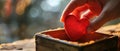 Hand Delicately Places Red Heart Inside A Special Box