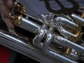 hand detail playing traditional band instrument