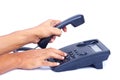 Hand dialing or picking up telephone. Royalty Free Stock Photo