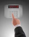 Hand dialling on keypad Royalty Free Stock Photo