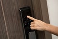 Hand and digital smart code lock into the modern apartment Royalty Free Stock Photo