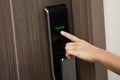 Hand and digital smart code lock into the modern apartment Royalty Free Stock Photo