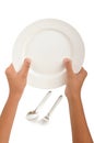 Hand with dinner plate Royalty Free Stock Photo