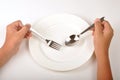 Hand with dinner plate Royalty Free Stock Photo