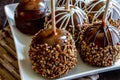 Hand Dipped Caramel Apples with Nuts and Chocolate Royalty Free Stock Photo