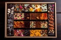 hand-dipped gourmet chocolate bar with assortment of toppings, including toasted nuts and dried fruit