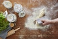 Hand dividing dough kitchen scene homemade baking