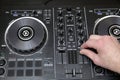 Hand of dj in action. Music background, banner. Modern technologies Royalty Free Stock Photo