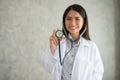 Hand of doctor asia girl holding a stethoscope.