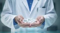 Hand of doctor holding a lot of pills in his hand Royalty Free Stock Photo