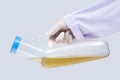 Hand doctor holding Portable urinal plastic Royalty Free Stock Photo