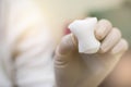 Hand of doctor holding sterile gauze for dressing wound