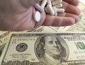 Hand dollars pills pill, tablet, medicinepharmaceutical