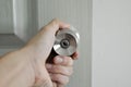 Hand on door knobs. Stainless door knob Royalty Free Stock Photo