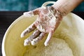 Hand with dough