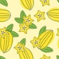 Hand draw seamless pettern with star fruit carambola on yellow background. Royalty Free Stock Photo