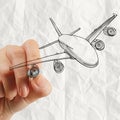 Hand drawing airplane with crumpled paper Royalty Free Stock Photo