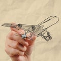 Hand drawing airplane with crumpled paper background Royalty Free Stock Photo