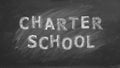 Charter school. Text on blackboard