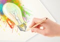 Hand drawing colorful idea light bulb with a pen Royalty Free Stock Photo