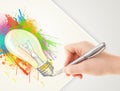 Hand drawing colorful idea light bulb with a pen Royalty Free Stock Photo