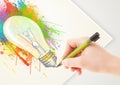 Hand drawing colorful idea light bulb with a pen Royalty Free Stock Photo