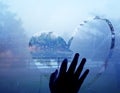 Hand drawing heart on wet window Royalty Free Stock Photo