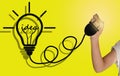 Hand drawing a light bulb Idea Royalty Free Stock Photo