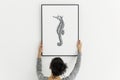 Hand drawing seahorse photo hanging on the wall