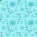 Hand drawn abstract Christmas seamless pattern with candy canes and snowflakes isolated on blue ice background Royalty Free Stock Photo