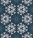 Hand drawn abstract winter snowflakes pattern. Stylish crystal stars on greenbackground. Elegant simple holiday all over print.