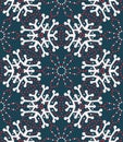 Hand drawn abstract winter snowflakes pattern. Stylish crystal stars on greenbackground. Elegant simple holiday all over