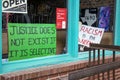 Hand-drawn anti-racist signs on display in the front window of a lounge in downtown Athens  Georgia. Royalty Free Stock Photo